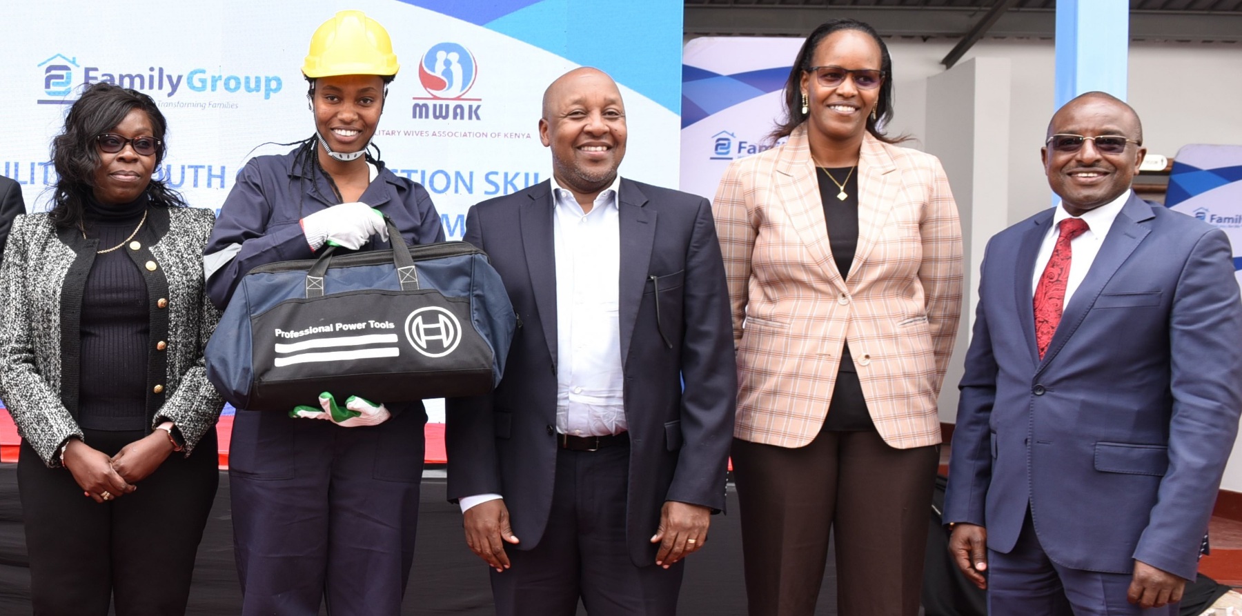 Metro Trans Investment Director Judy Omurwa & CFAO Mobility Kenya Group MD Arvinder Reel receive a cheque from Family Bank CEO Nancy Njau during the handover of 14 Hino buses acquired through a financing of KES. 103 million from the Bank. PHOTO/ COURTESY