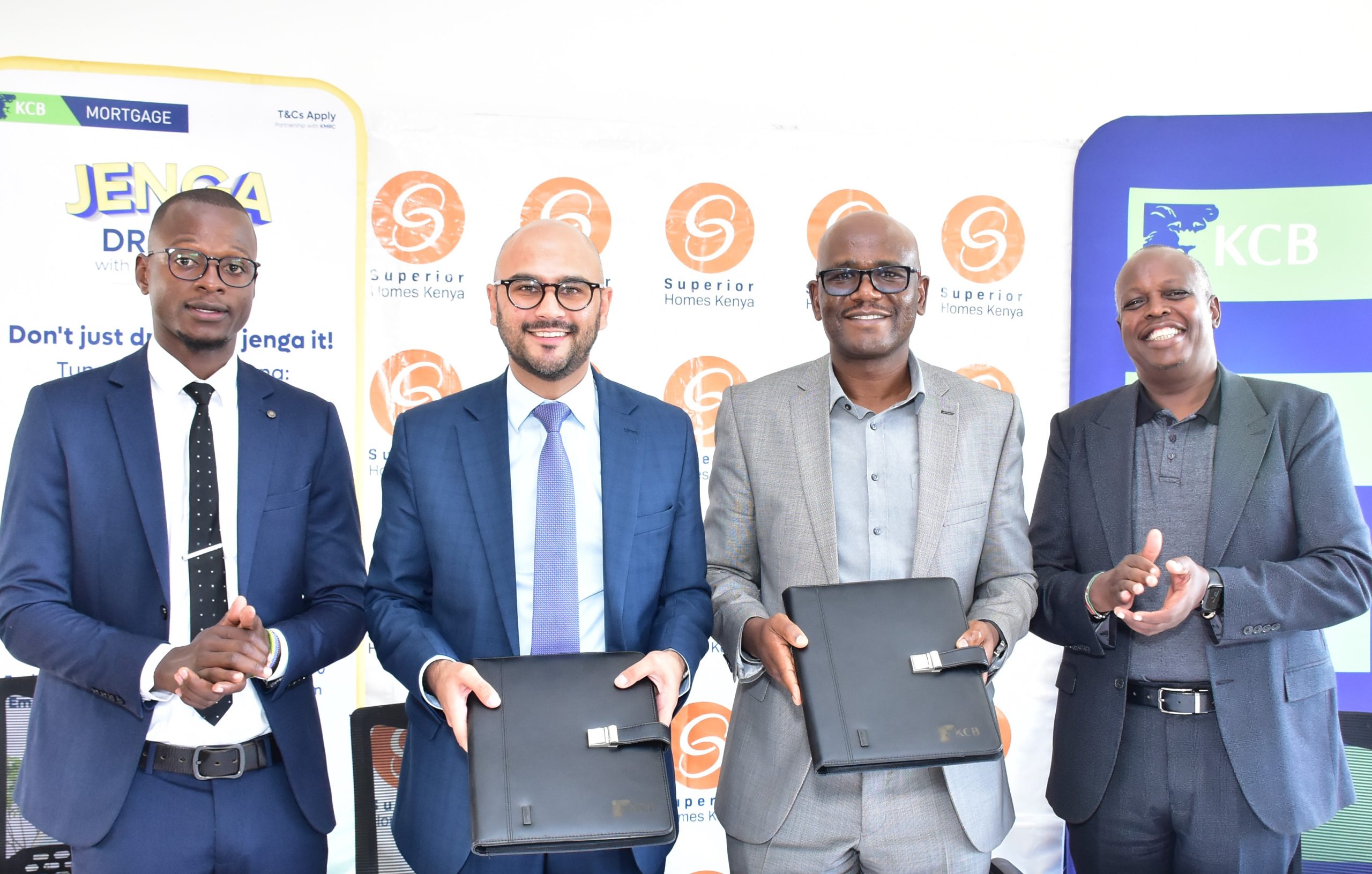 Superior Homes Head of Sales Clive Ndege, CEO Shiv Arora, KCB Bank Senior Manager, Green Financing & Sustainability Alois Ngure and Head of Projects and Investments Kenneth Luusa during the signing of an MOU between KCB Bank and Superior Homes that seeks to enable homeowners to access the KMRC mortgage facility at 105 per cent.