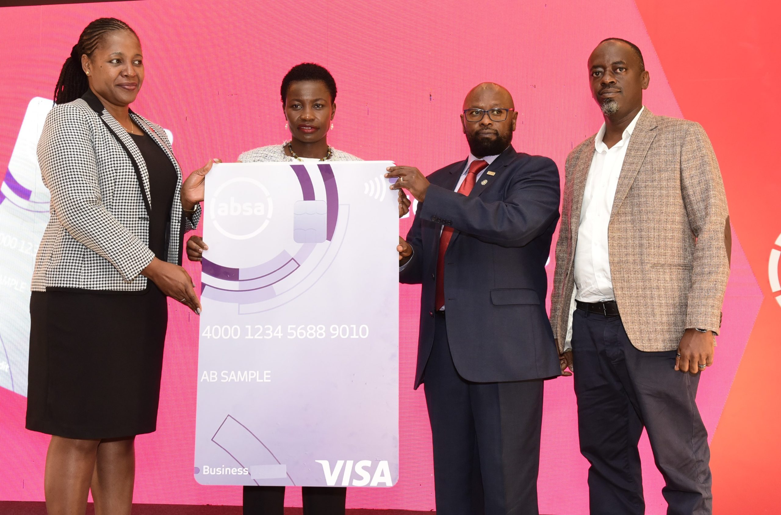 1.PS, State Department for Micro, Small and Medium Enterprises Development Hon. Susan Mang’eni (2L) joins Absa Bank Kenya Business Banking Director Elizabeth Wasunna (L), Visa Kenya Country Manager John Njoroge and Absa customer Silver Tech Solution Director Elias Mwangi (R) during the launch of the Absa Business Credit Card in Nairobi.