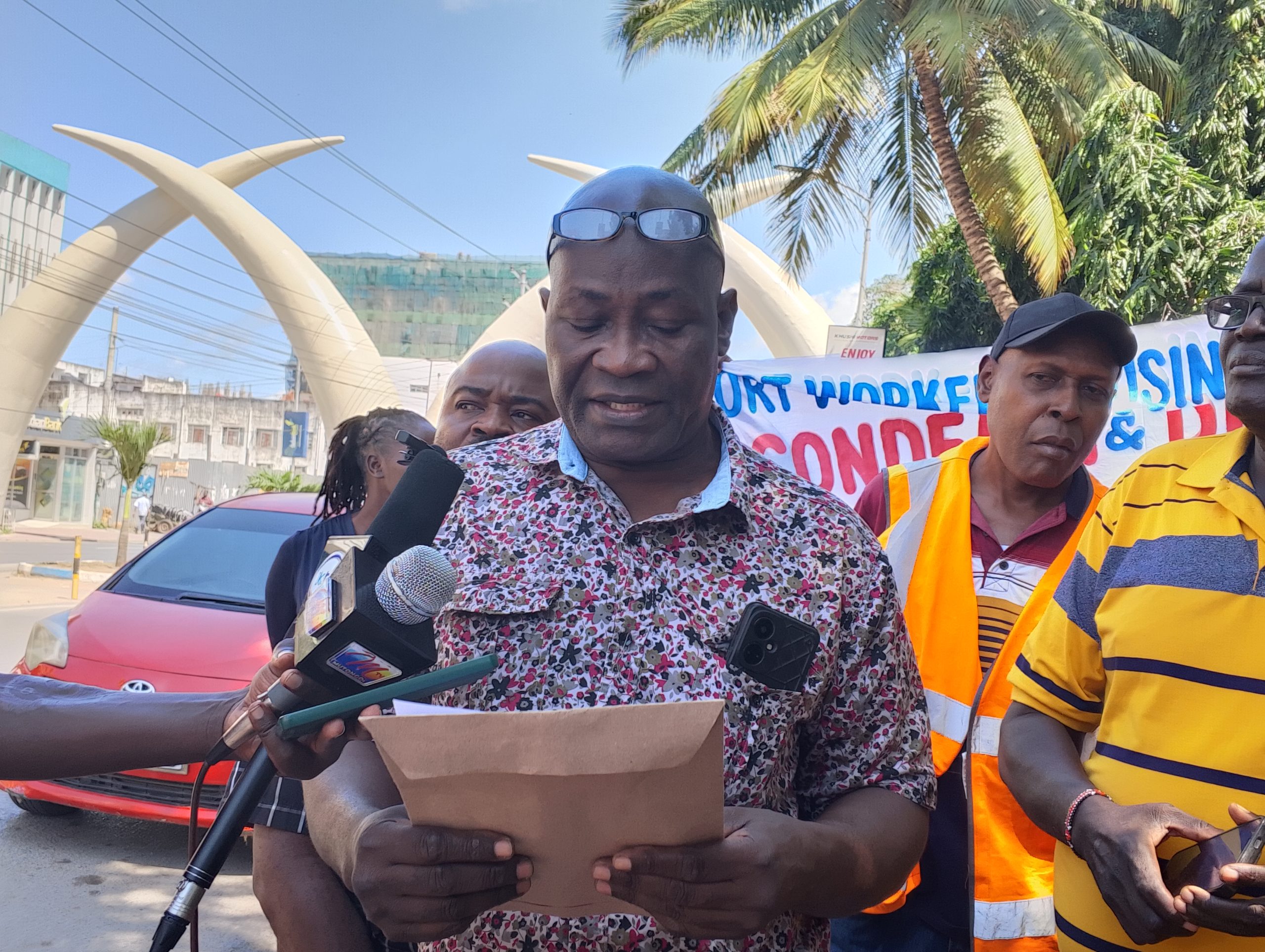 Former Dock Workers Union (DWU) officials led by Wycliffe Baraza and Paul Abisa addressing journalists at the famous Tusks along Moi Avenue in Mombasa county.