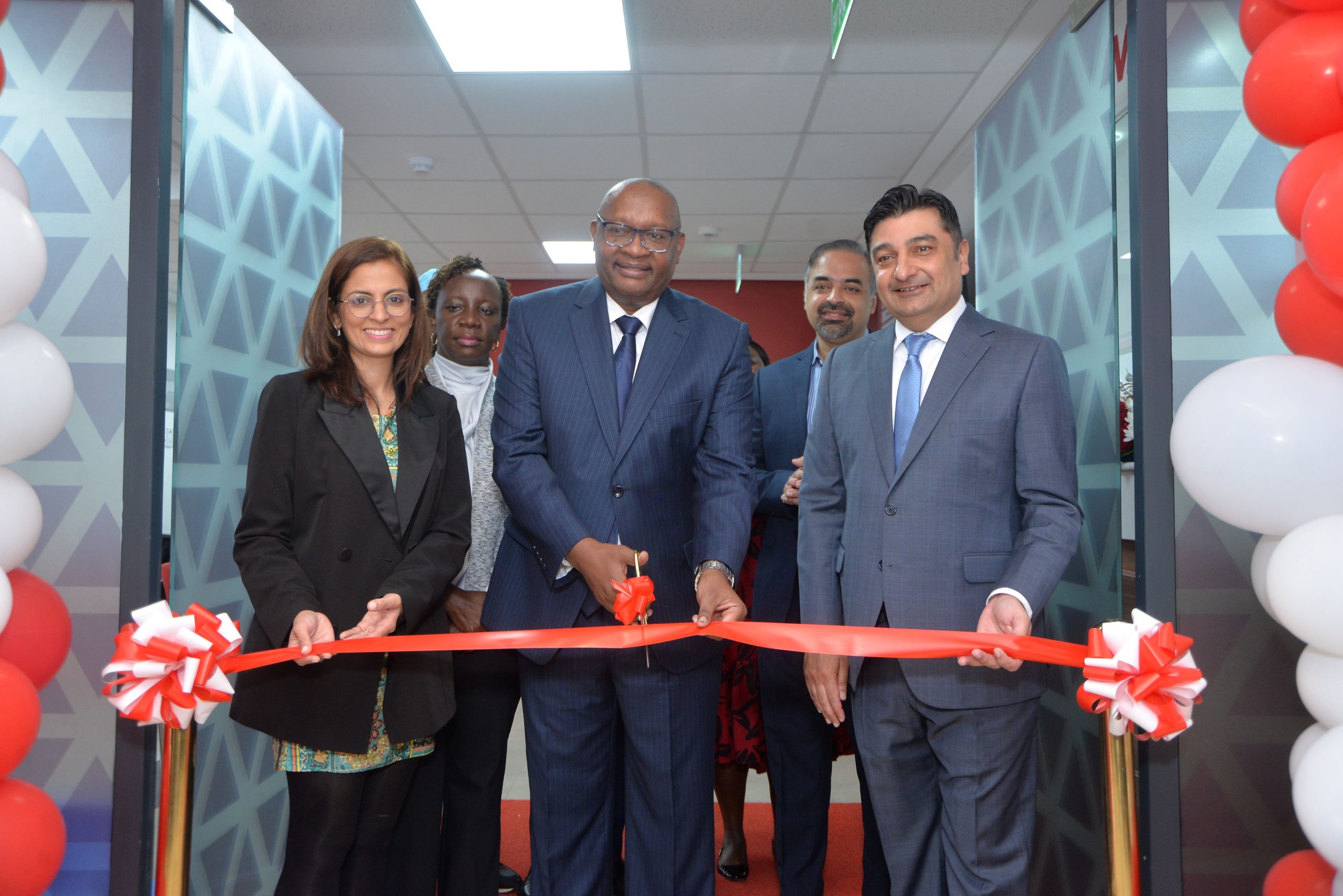 Minet Kenya CEO Sammy Muthui (C), Aga Khan University Hospital Head of Outreach Health Network Dr. Jyoti Bhayani & CEO Rashid Khalani during the opening of the hospital’s 54th medical centre along Raphta Road in Westlands. Looking on is the hospital's Head of Marketing & Partnerships Pauline Ngatia and COO Khurram Jamal.